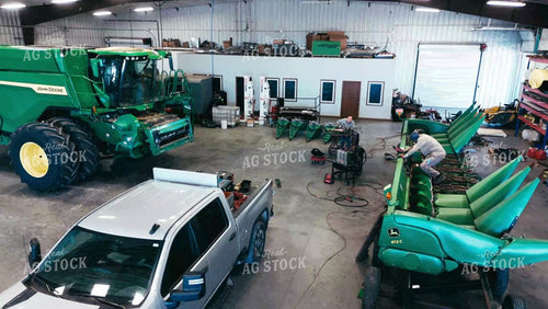 Farmer Fixing Combine Head 239101