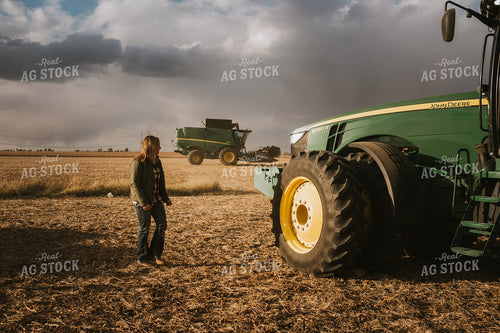 Female Farmer Getting in Tractor 3518