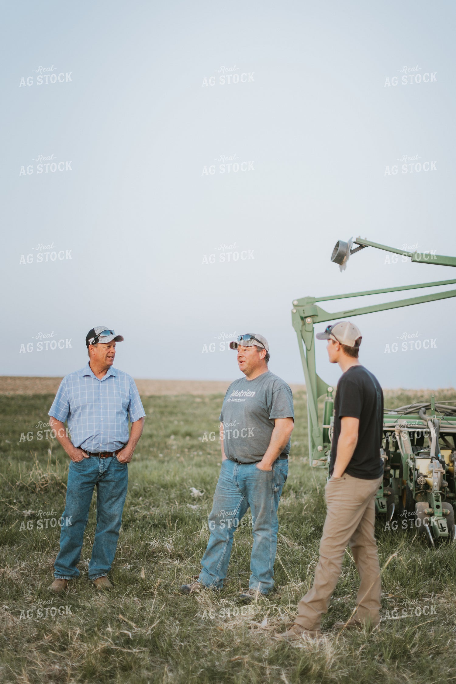 Farmers Talk Beside Planter 7740