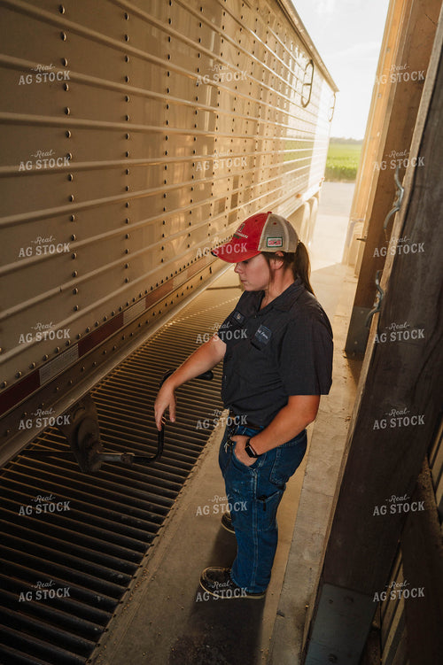 Female Farmer Dumping Semi 115257