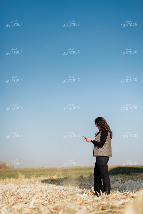 Female Appraiser Flying Drone 9440