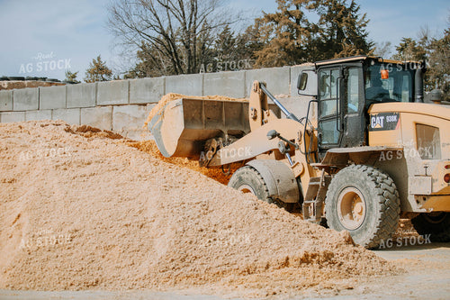 Feed Being Loaded with Loader 77207