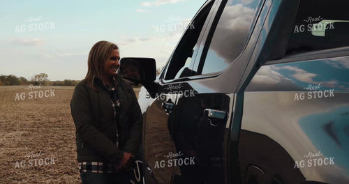 Female Farmer Talking to Mom in Pickup Truck 3969
