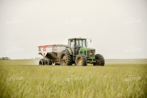 Spreading Dry Fertilizer 64281