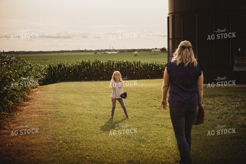 Farm Family Playing Catch Alongside Corn Field 4481