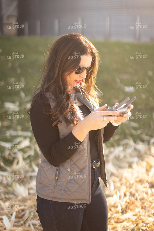 Female Appraiser Flying Drone 9441