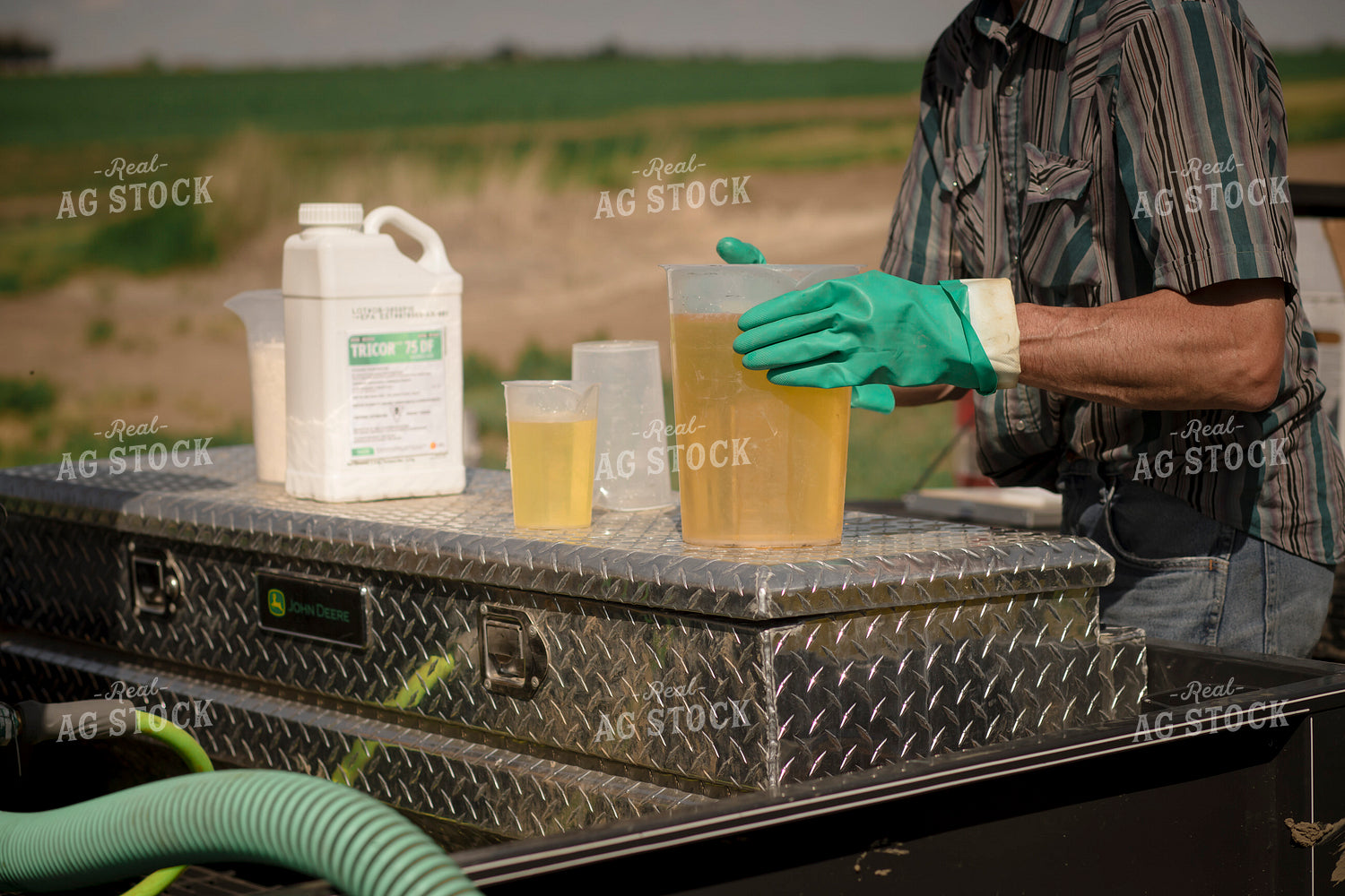 Farmer Measuring Herbicide 135106