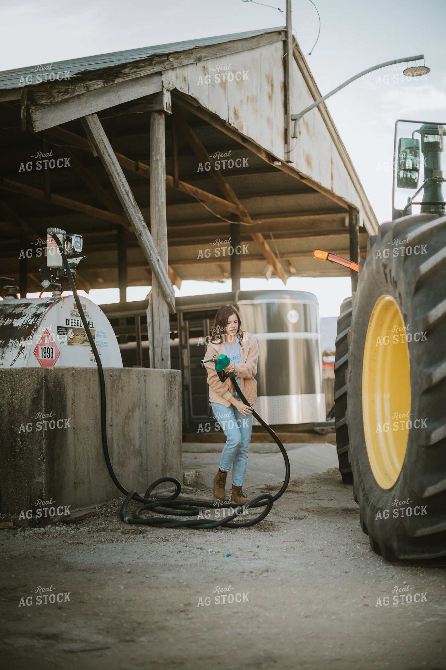 Farmer Fueling Tractor 6839