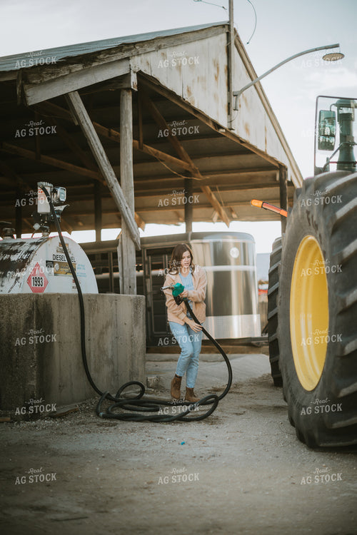 Farmer Fueling Tractor 6839
