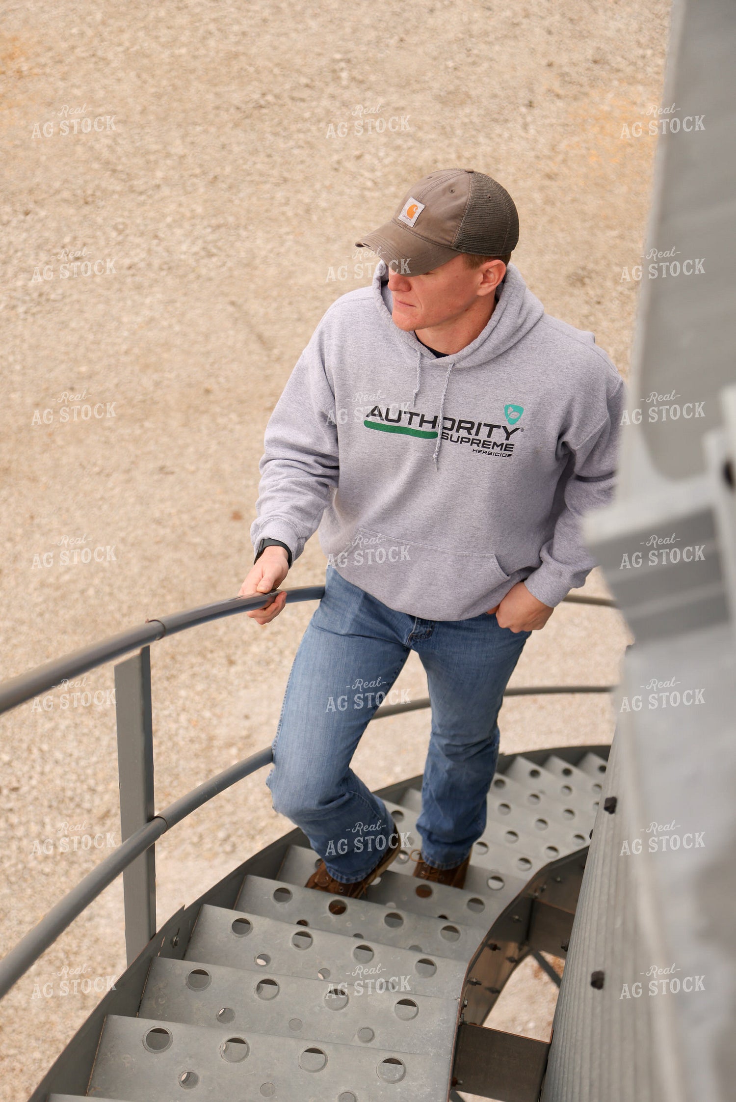 Farmer Climbing Grain Bin 161122
