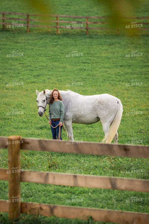 Female Equestrian with Horses 270399