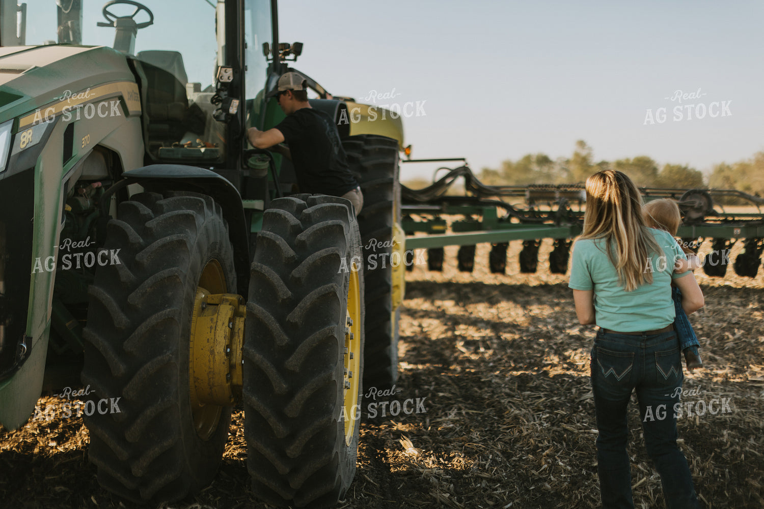 Young Couple with Child Walk Toward Tractor 7656