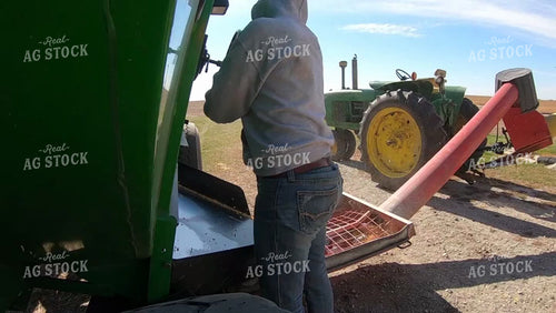 Female Farmer Loading Bin with Sweep Auger 161147