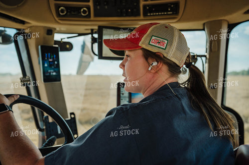 Female Farmer Driving Tractor 115219