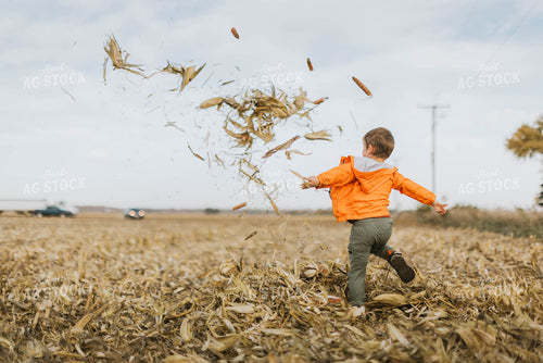 Farm Kid Playing in Cornfield 8527