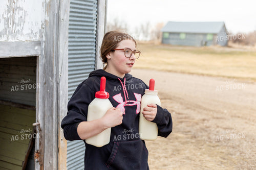 Farm Kid Carrying Calf Bottles 155376