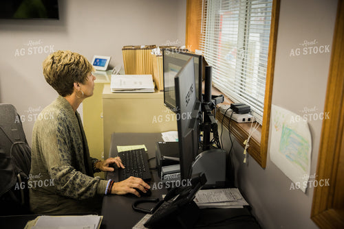 Retailer Working in Office 7957