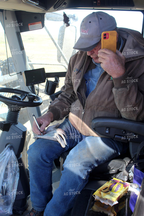 Farmer Taking Notes on Glove 141059