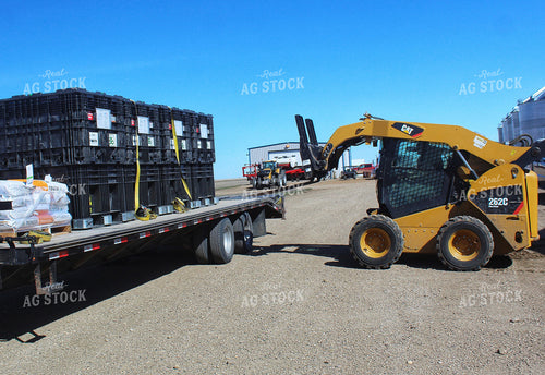Seed Salesman Unloading Pro Boxes 141230