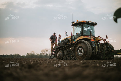 Farmer Walking Toward Planter Tractor with Farm Kid 5668