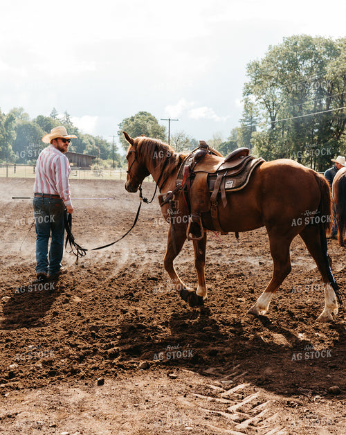 Rancher Leading Horse 232001