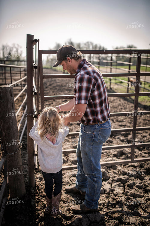 Rancher and Daughter Checking Cattle 285042