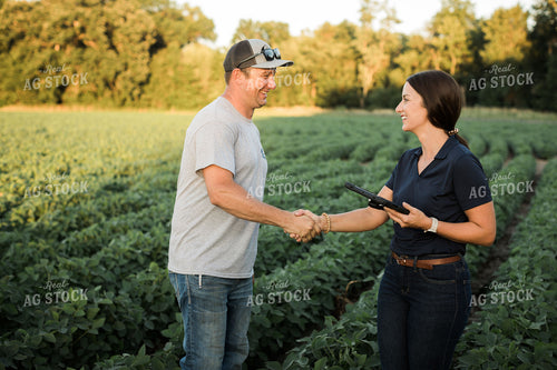 Agronomist and Farmer in Soybean Field Shaking Hands 6101