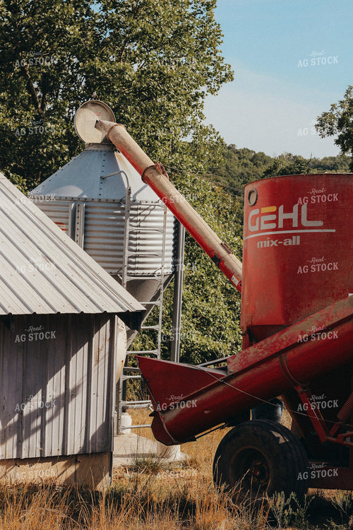 Farmer Loading Bottom Feed Hopper Bin 101051