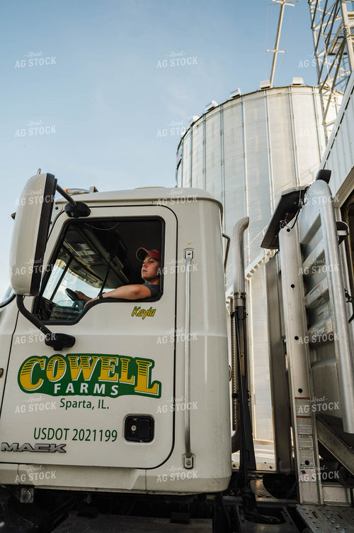 Female Farmer Driving Semi 115250