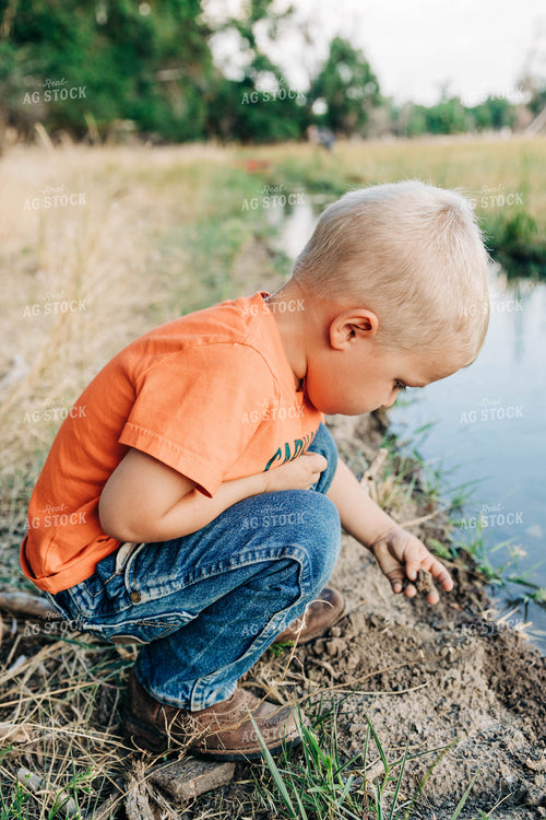 Farm Kid with Ditch Irrigation 61034