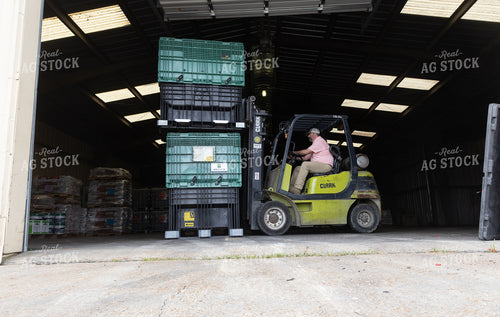 Forklift Moving Bulk Containers 79865