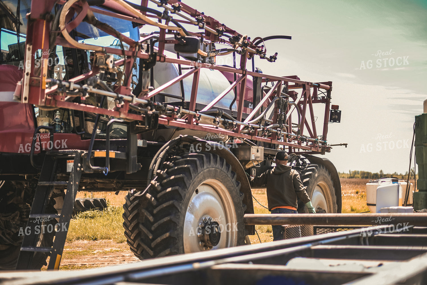 Farmer Mixing Chemicals for Self Propelled Sprayer 191072