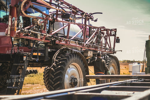Farmer Mixing Chemicals for Self Propelled Sprayer 191072