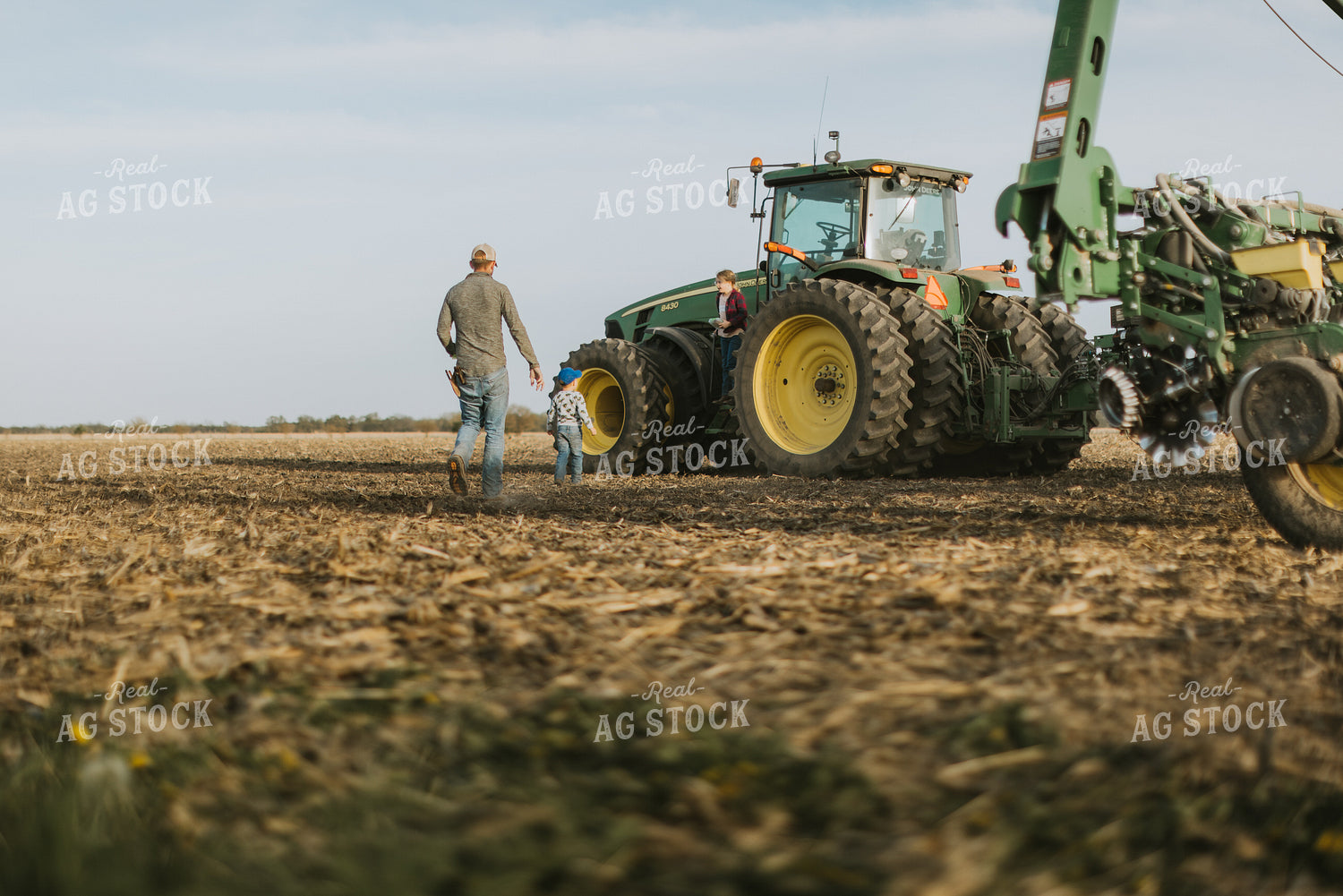 Farmer Walking to Tractor with Kids 8210