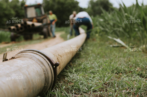 Close Up of Irrigator Pipes Being Lined Up 101033