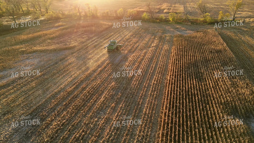 Aerial of Combine Driving in Field at Harvest 268269