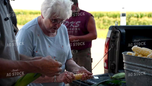 Family Shucking Sweet Corn - 251