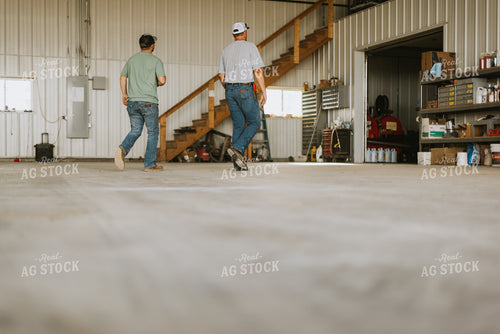 Farmers Walking in Shed 7745