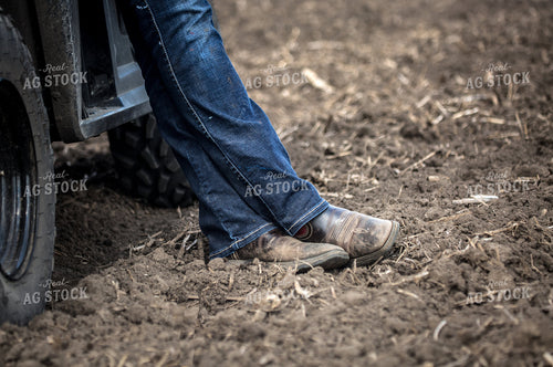Farmer in Boots in Soil 161180