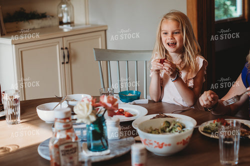 Farm Family Talking and Eating around Table 4434