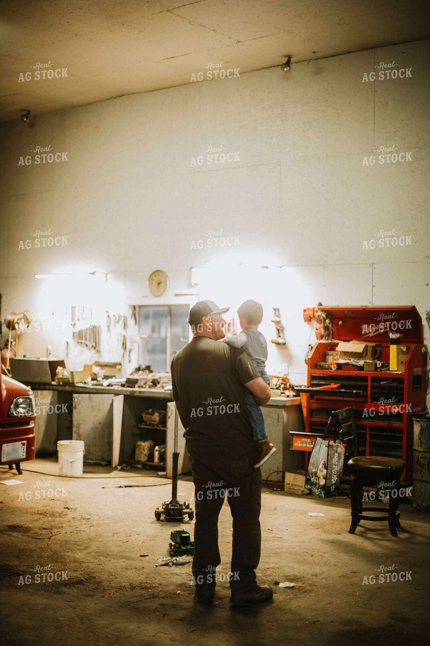 Farmer with Farm Kid in Shop 5138