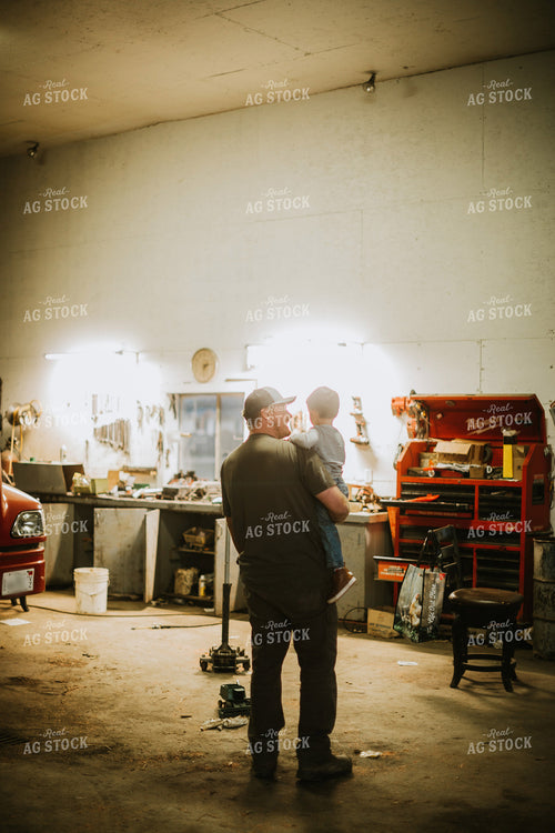 Farmer with Farm Kid in Shop 5138