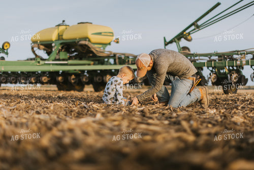 Farmer Checking Seed Depth with Son 8218