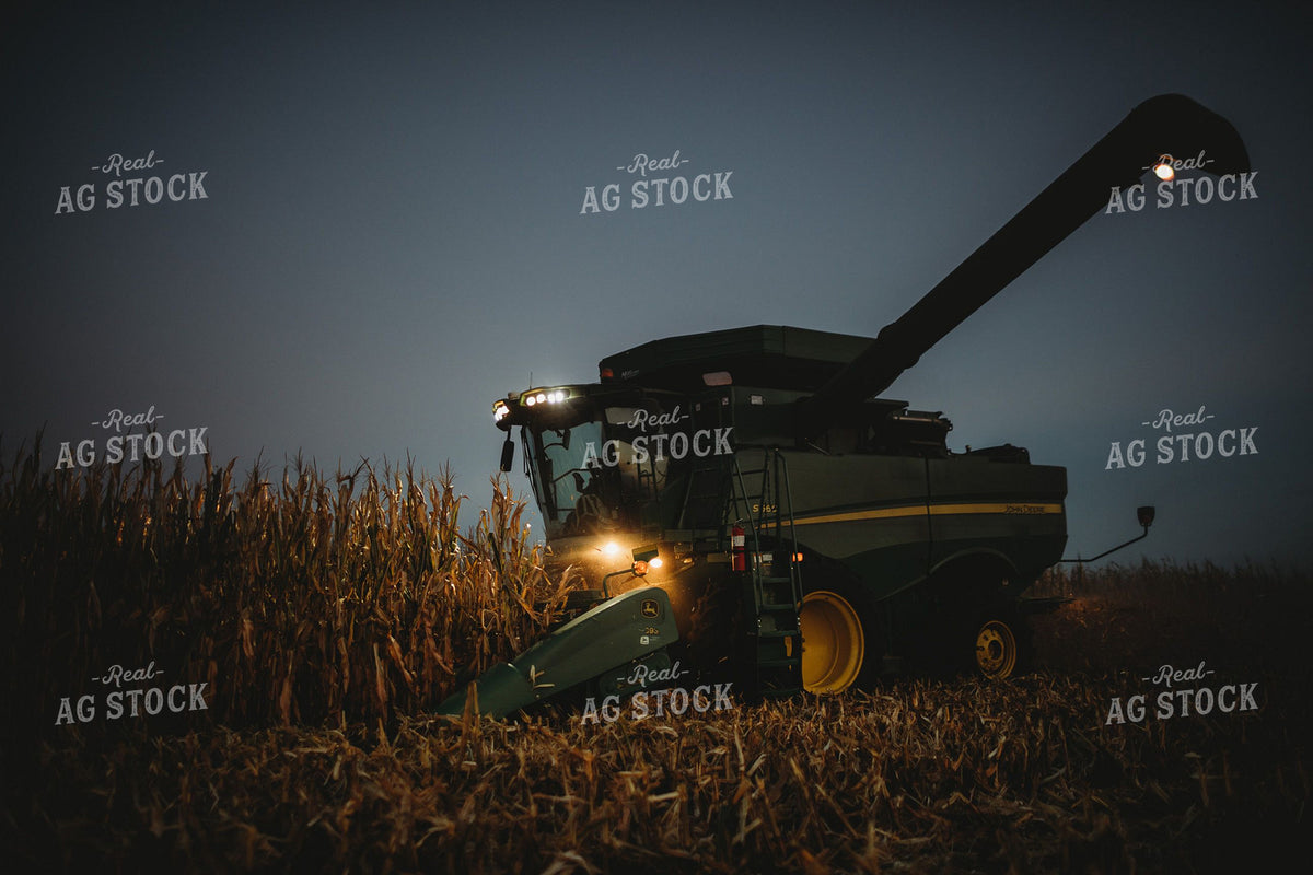 John Deere Combine Harvesting Corn at Night 400040
