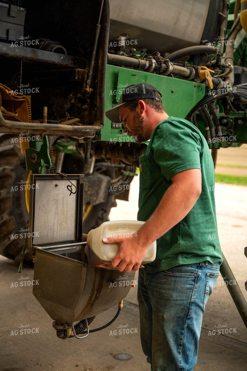 Farmer Filling Self-Propelled Sprayer 115743