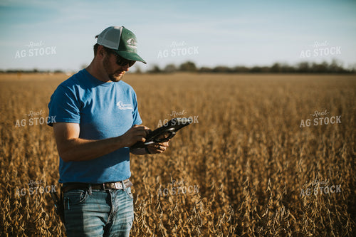 Farmer in Field with Tablet 7165