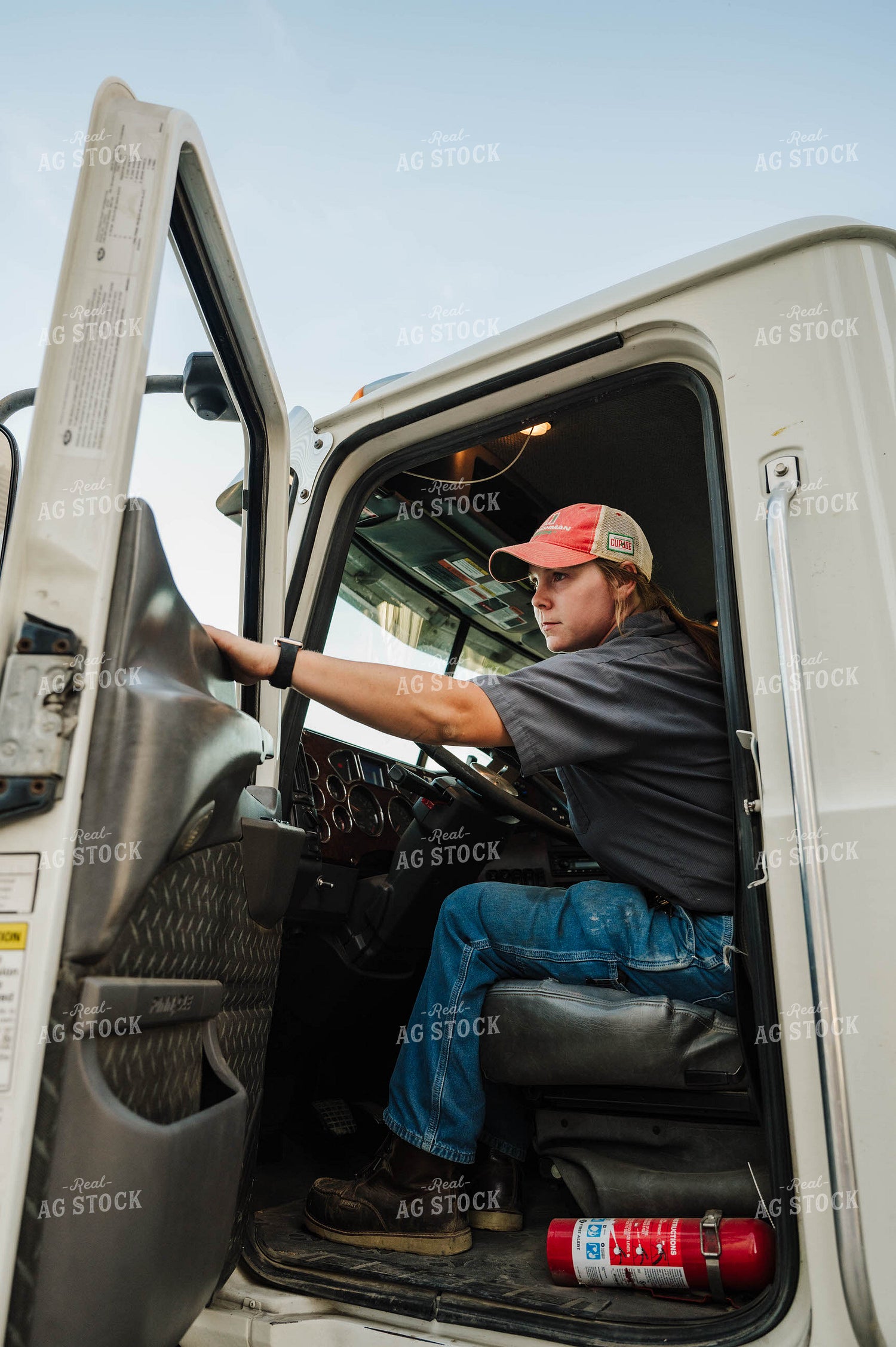 Female Farmer Driving Semi 115282