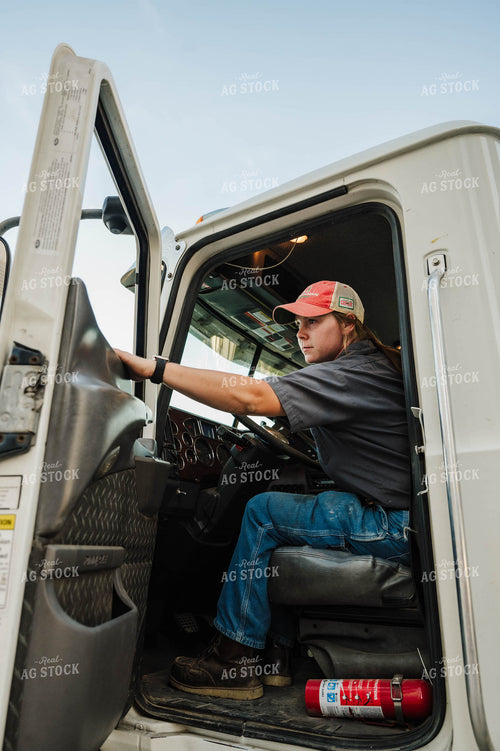 Female Farmer Driving Semi 115282