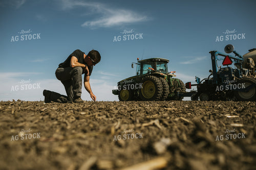 Farmer Checking Seed Depth 4106