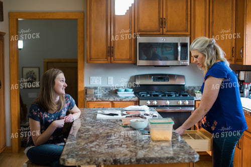 Farm Wife Prepping Meal in Kitchen with Daughter 4425